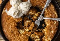 Pumpkin Cheesecake Skillet Cookie in a Cast-Iron Pan