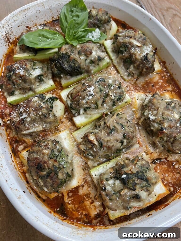 Finished gagootz recipe in white baking dish with basil sprig garnish.