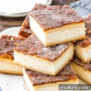 These sopapilla cheesecake bars have a thick layer of creamy cheesecake between 2 sheets of flaky pastry. Then they're topped with buttery cinnamon sugar. This version of sopapilla is made with only 8 ingredients - so it's quick, easy & oh so delicious.