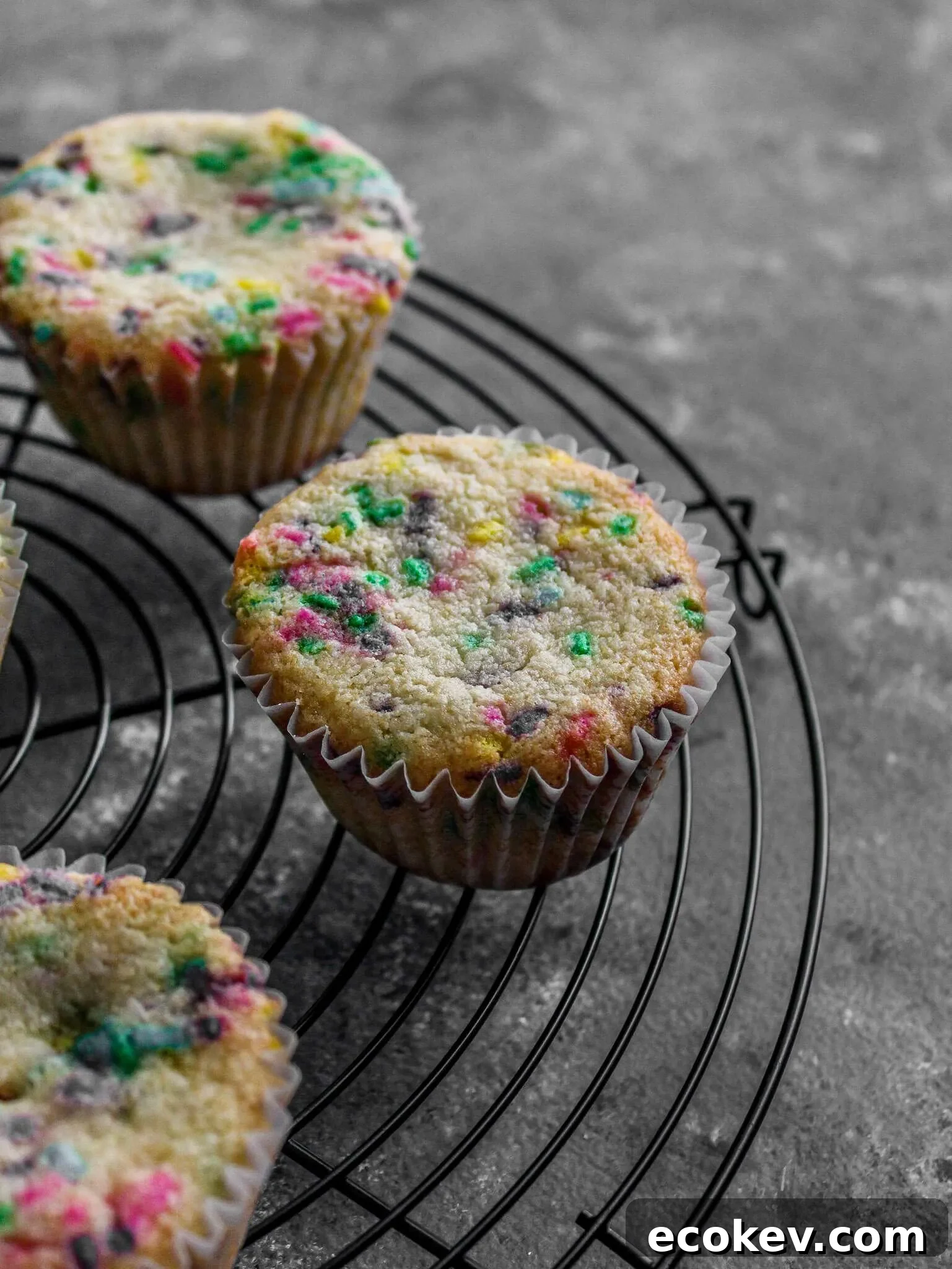 funfetti cupcakes on wire rack