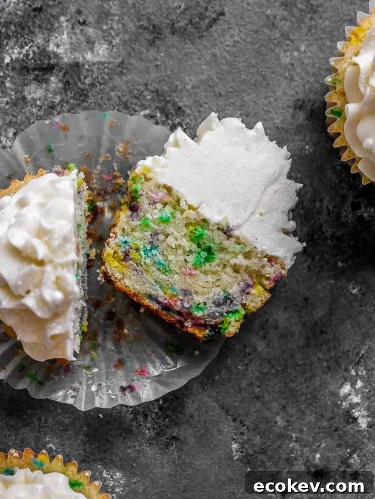frosted funfetti cupcake split in half (1)