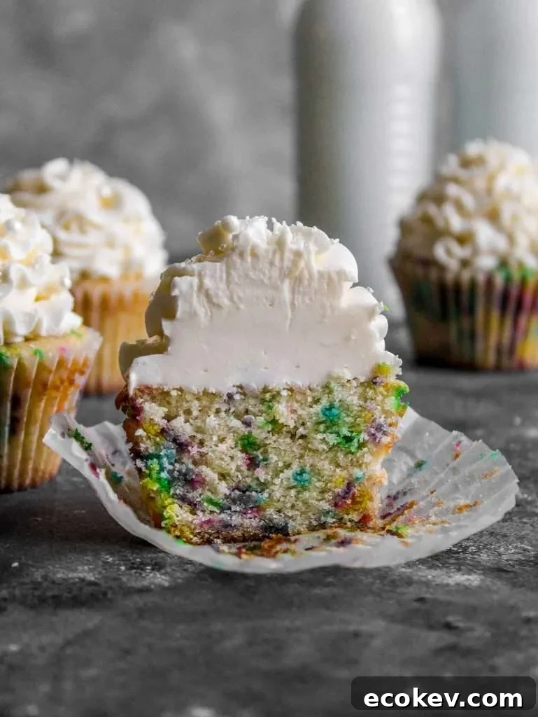 frosted funfetti cupcake split in half (2)