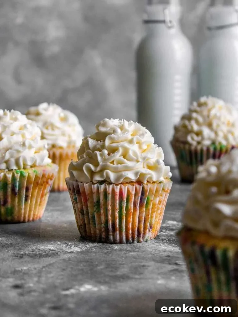 frosted funfetti cupcakes on table