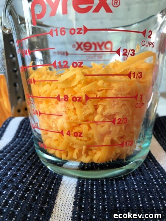 Cheese in a measuring cup