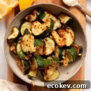 Crispy low-carb air fryer parmesan zucchini without breading.