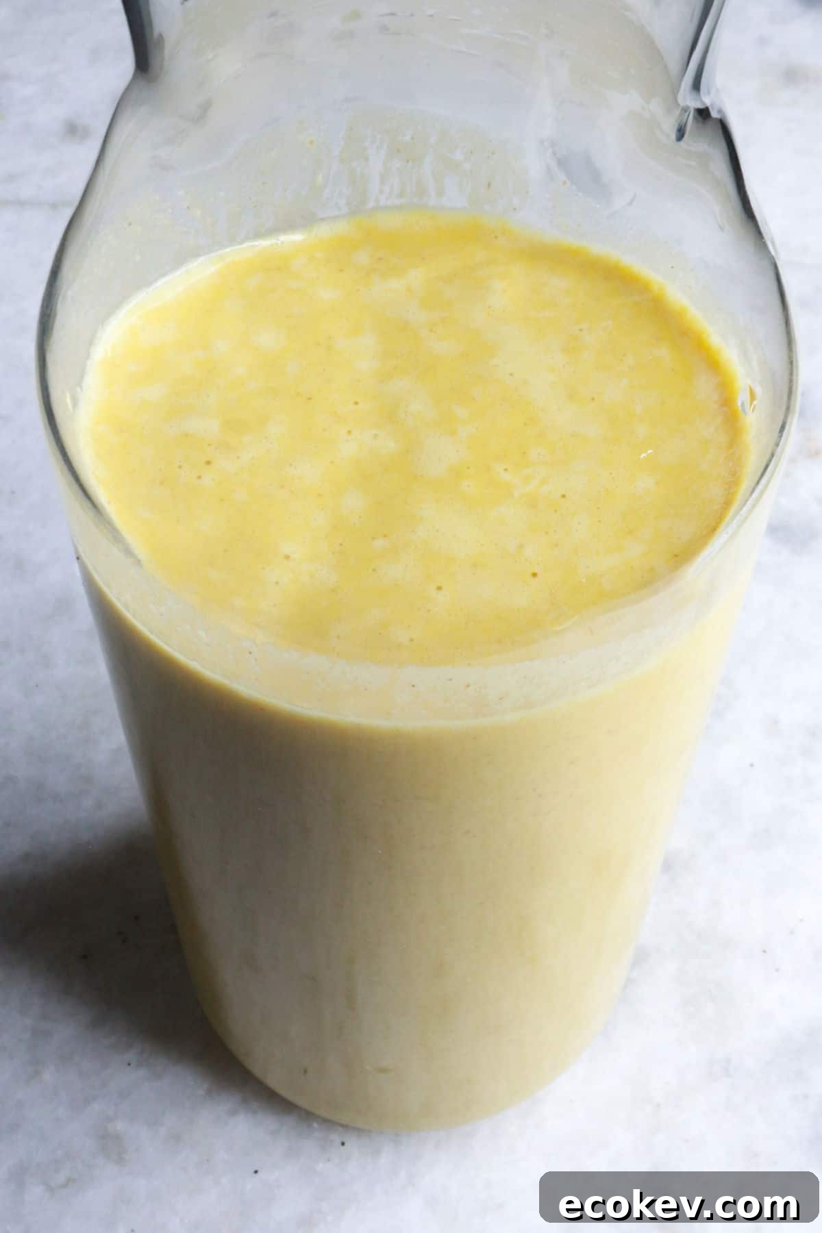 Pumpkin spice horchata in a clear glass bottle