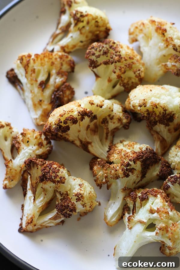 roasted cauliflower on a white plate.
