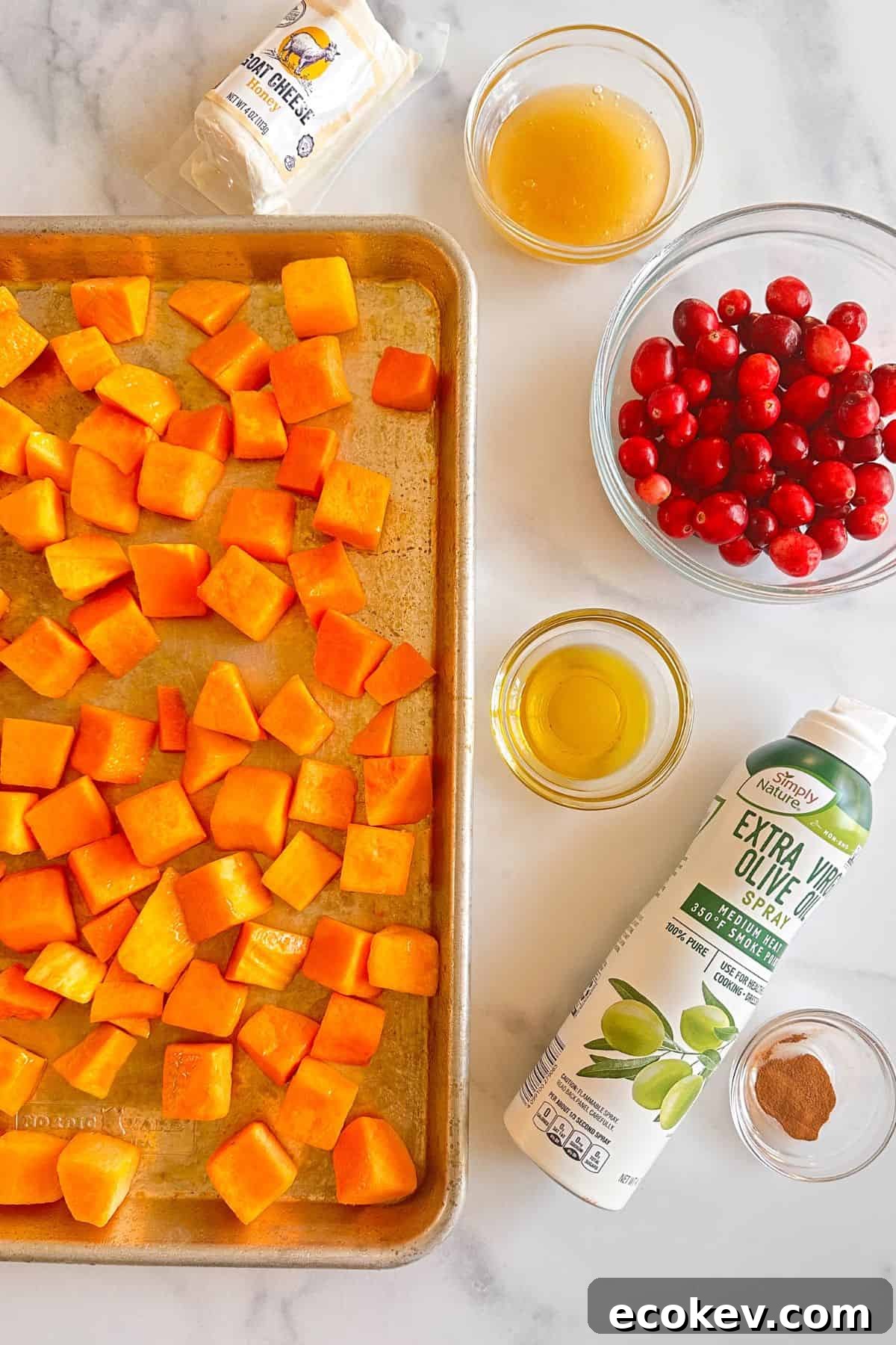 Ingredients for Roasted Butternut Squash with honey, cinnamon, cranberries, and goat cheese.