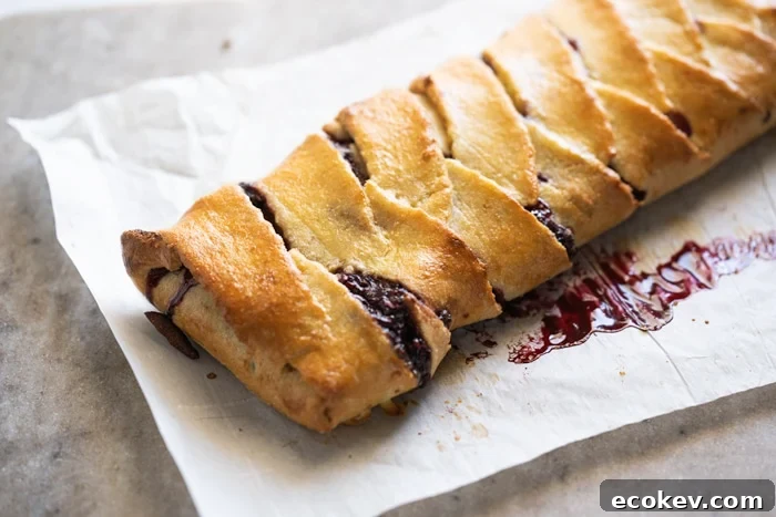 Freshly baked keto danish braid on parchment paper