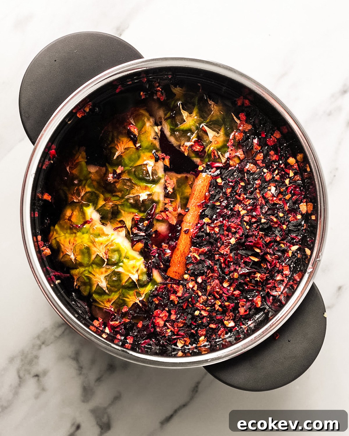 pineapple peels and hibiscus in pot