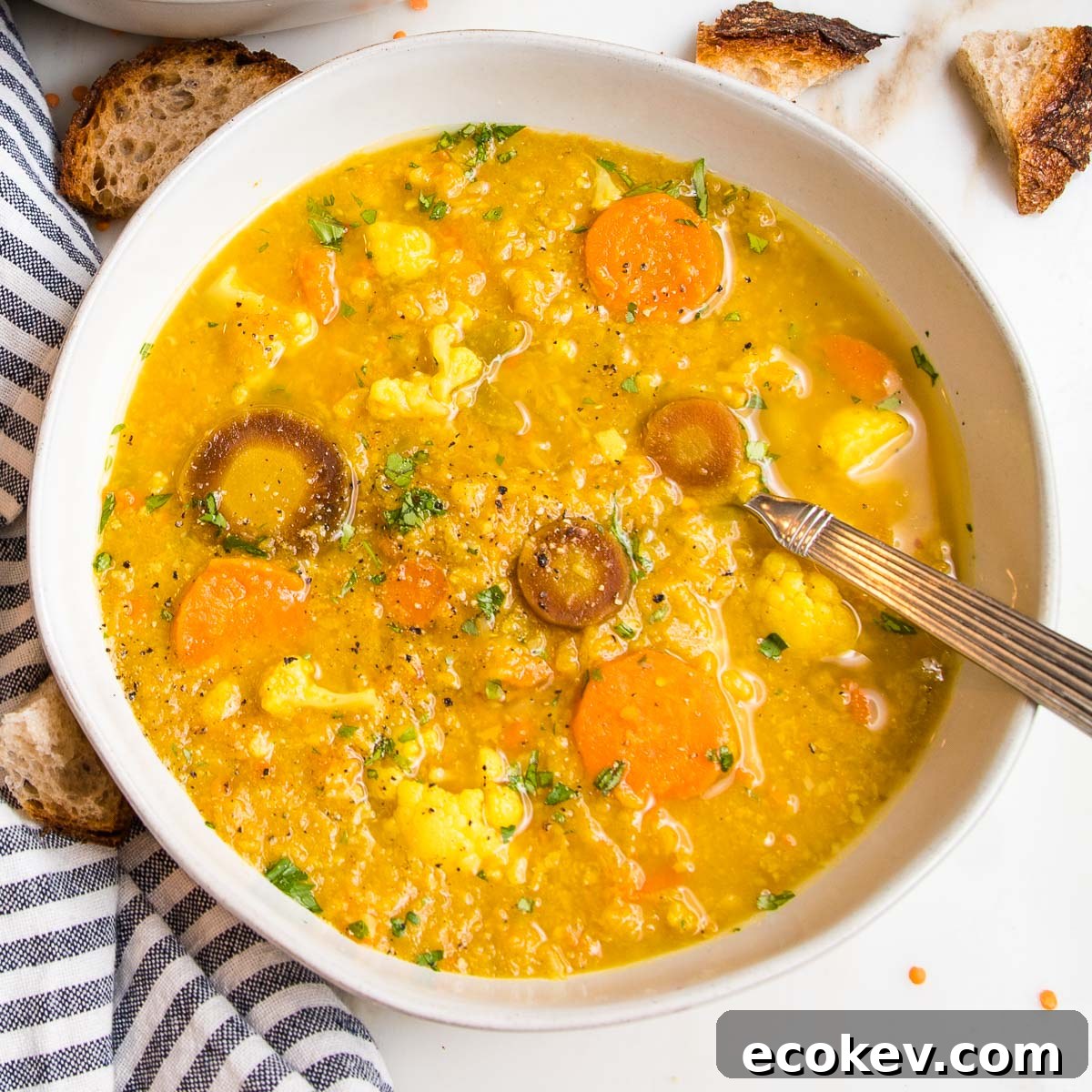 Chunky cauliflower, carrot and red lentil soup.