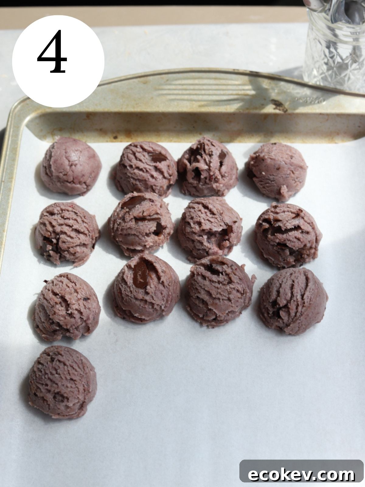 Cookie dough balls on a sheet