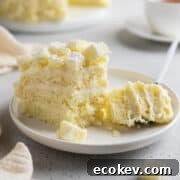 Sliced of torta Mimosa on a dessert plate.