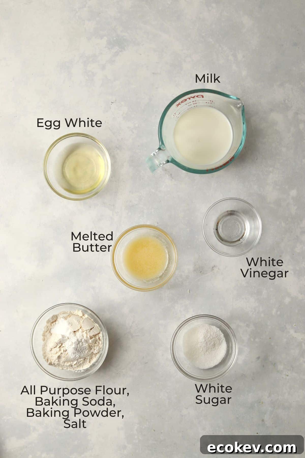 Ingredients to make small batch pancakes in glass prep bowls.