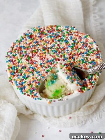 Single serve dot cake with nonpareils in a ramekin.