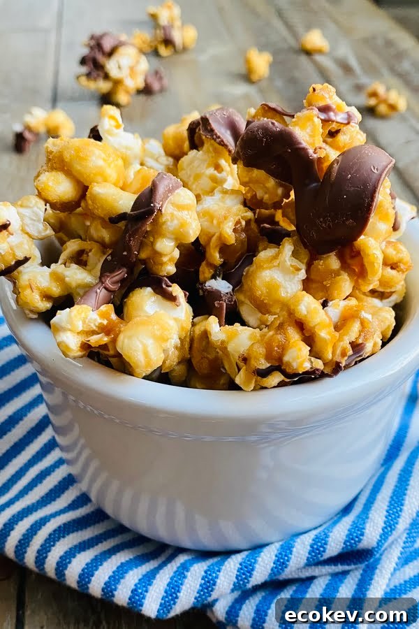 bowl of salted caramel popcorn with chocolate drizzle
