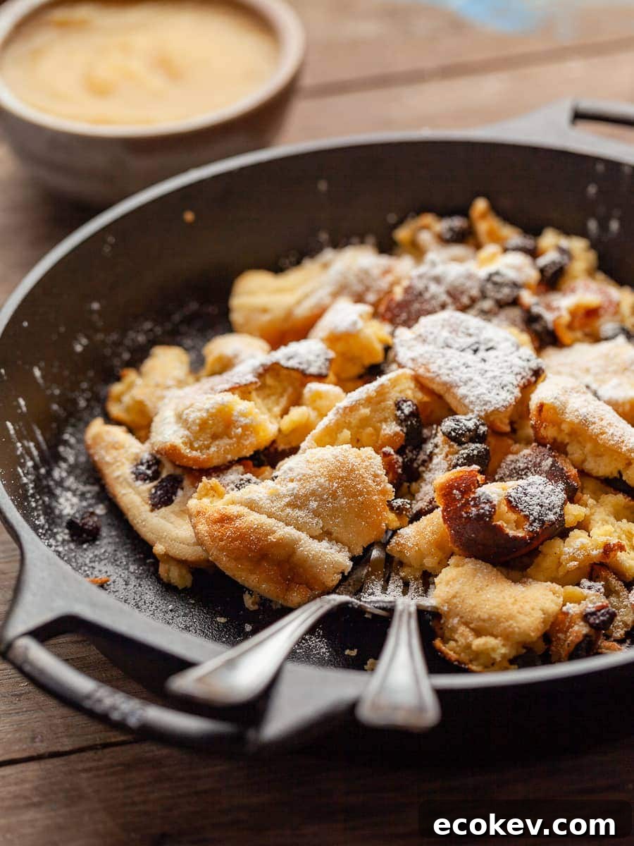 a pan of gluten free kaiserschmarrn with apple sauce