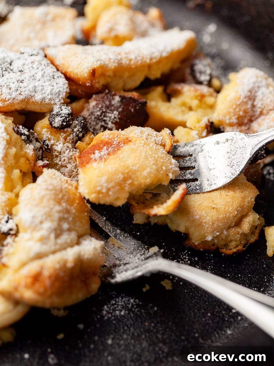 close up of gluten free kaiserschmarrn in a pan with two forks