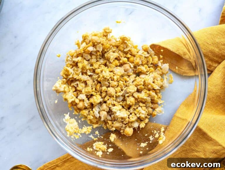 Step 2 Chickpeas mashed with fork in large mixing bowl.