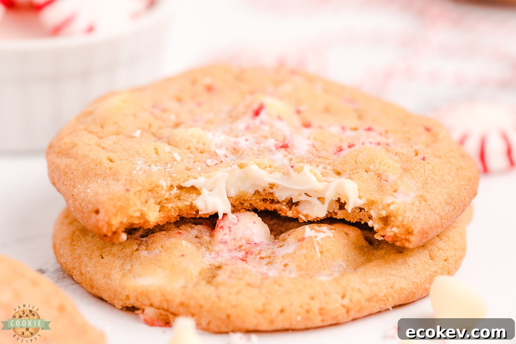 bite taken out of a white chocolate peppermint cookie