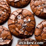 top view super close up of chocolate brownie cookie with flaked sea salt on top