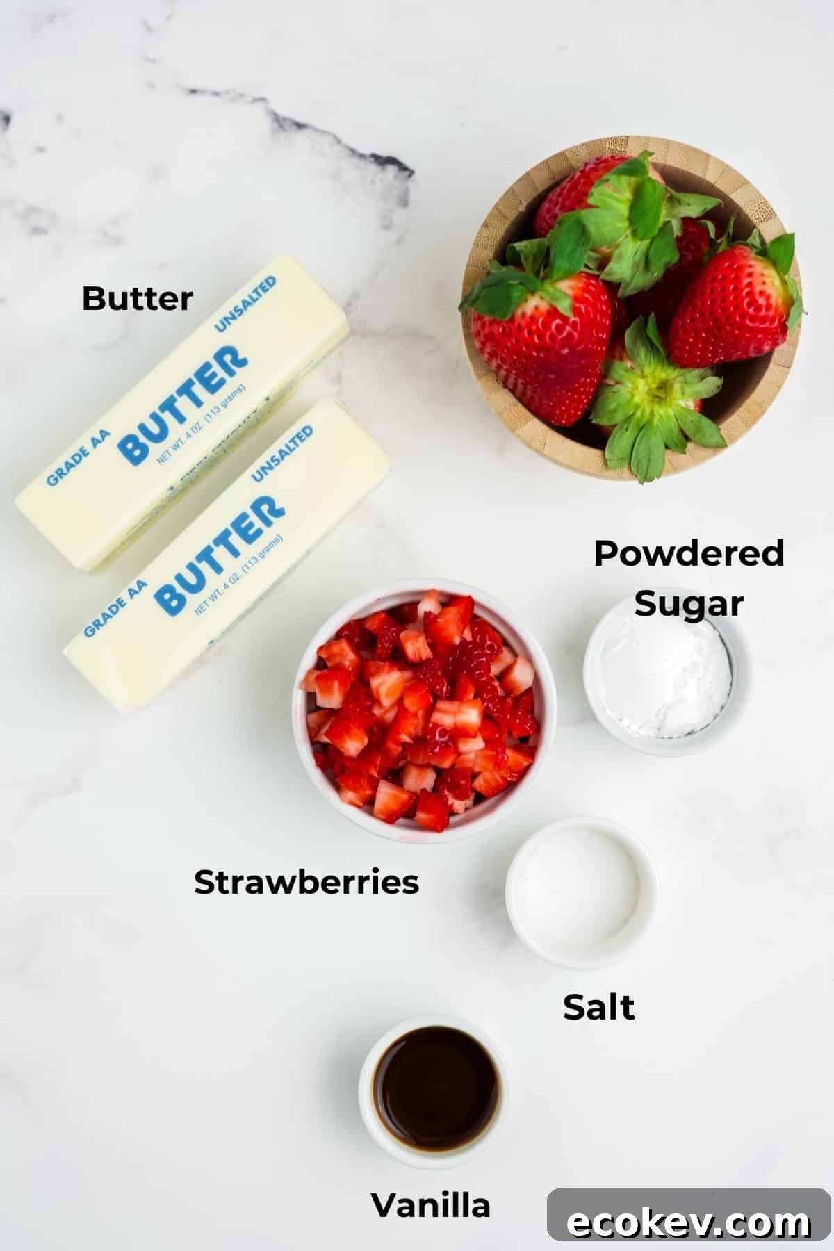 Ingredients for making strawberry butter in bowls.
