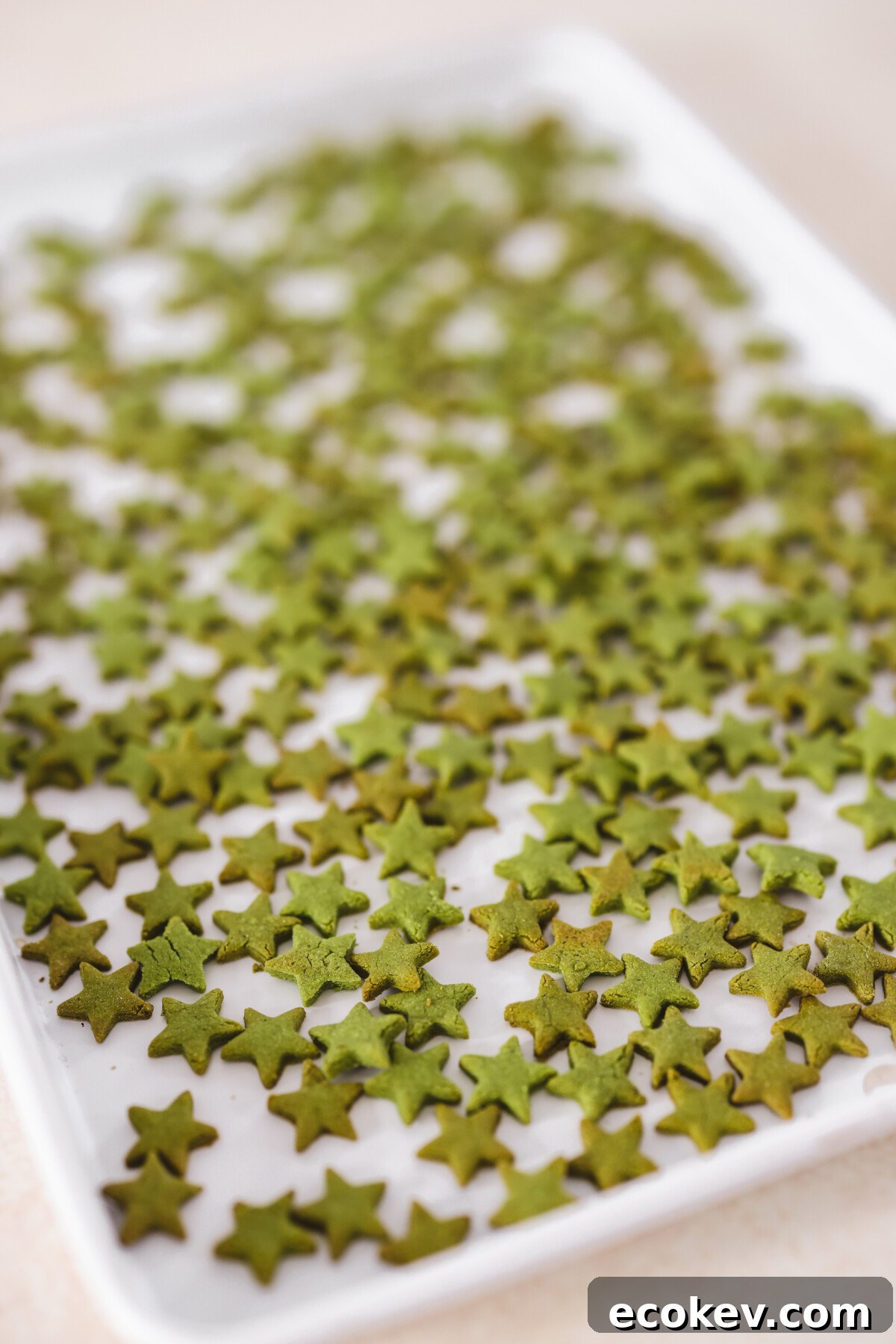 baked matcha cereal on a baking sheet