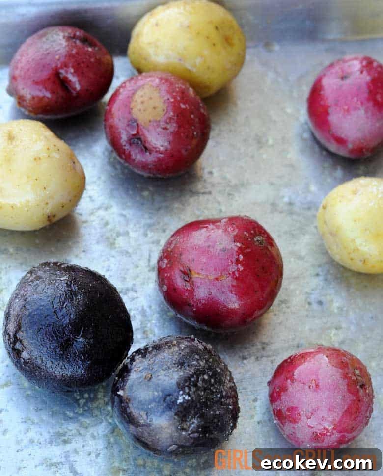 seasoned small potatoes on pan