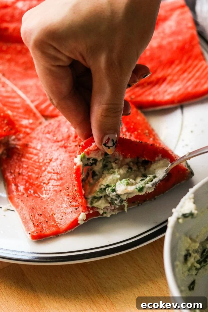 how to make stuffed salmon with spinach - using a spoon to stuff a salmon