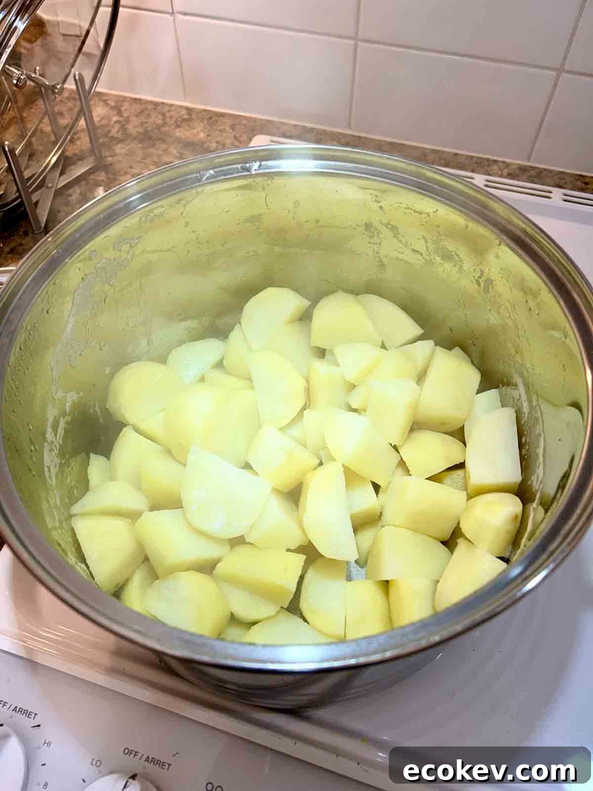potatoes resting in pot after being drained.