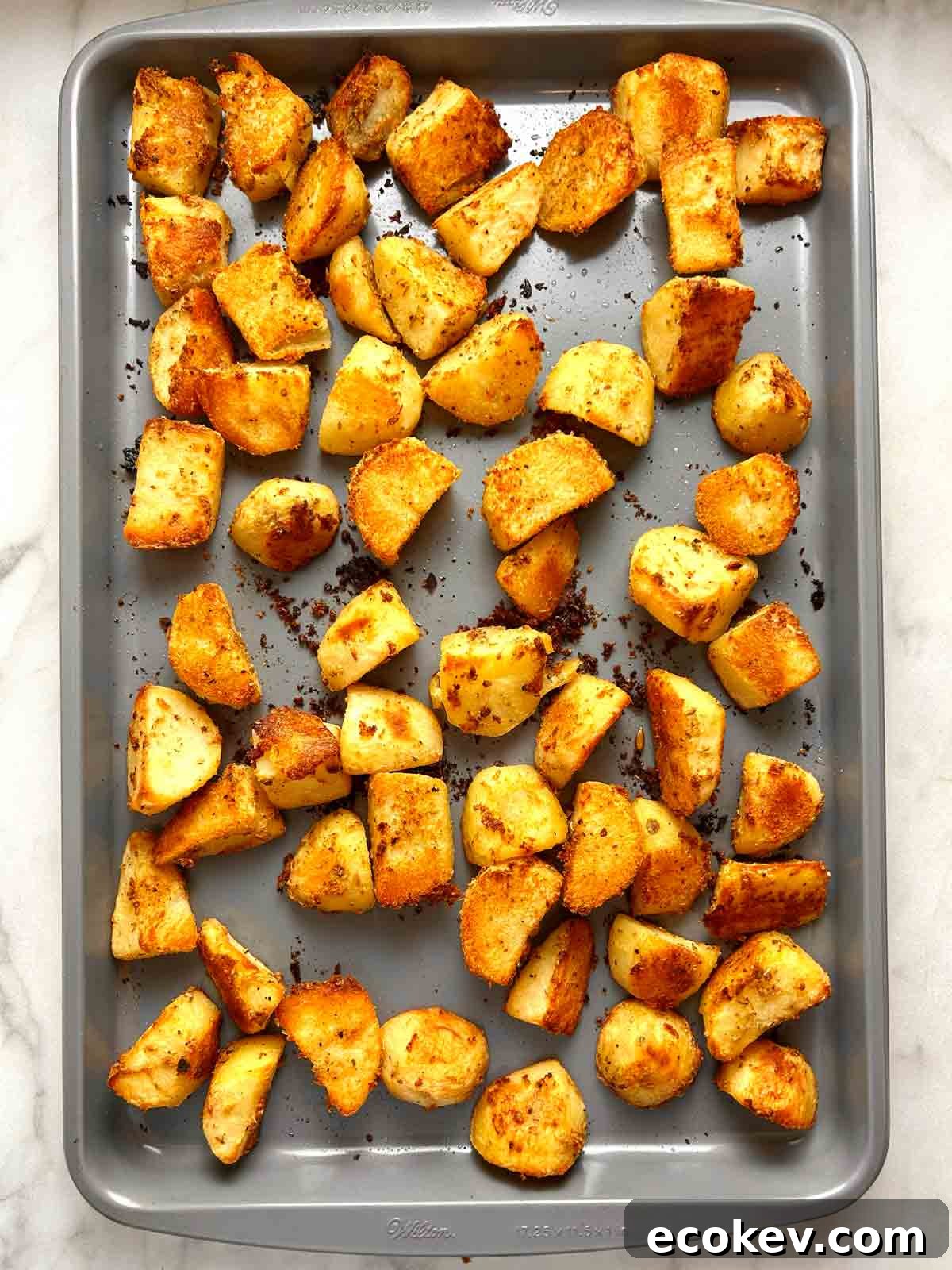 potatoes after roasting for one hour; crusts are golden brown and crispy.