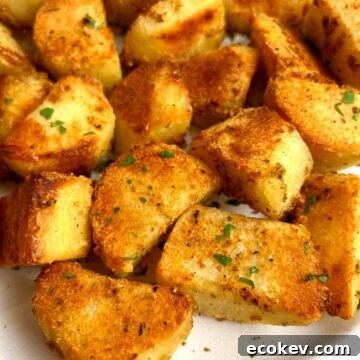 close up of roasted potatoes on plate.