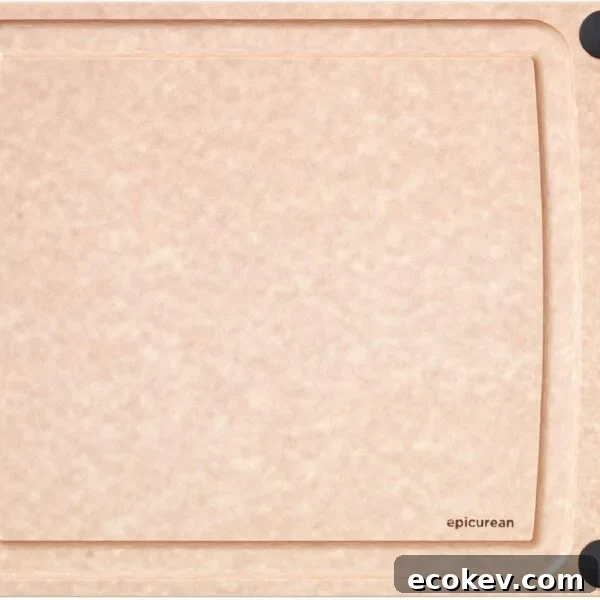 A rectangular, light brown cutting board with a smooth surface, four black non-slip corners, and a small hole on the left side. The brand name epicurean is printed in the lower right corner.