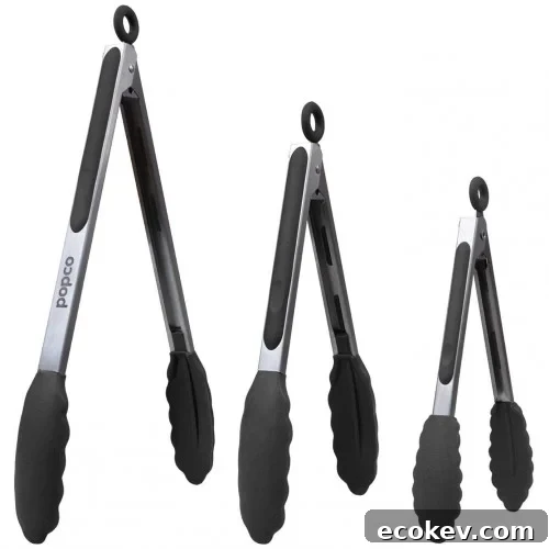 Three stainless steel kitchen tongs with black silicone grips and scalloped edges, shown in small, medium, and large sizes, standing upright against a white background.