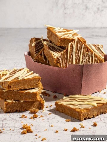 Biscoff slices in a pink carton box.