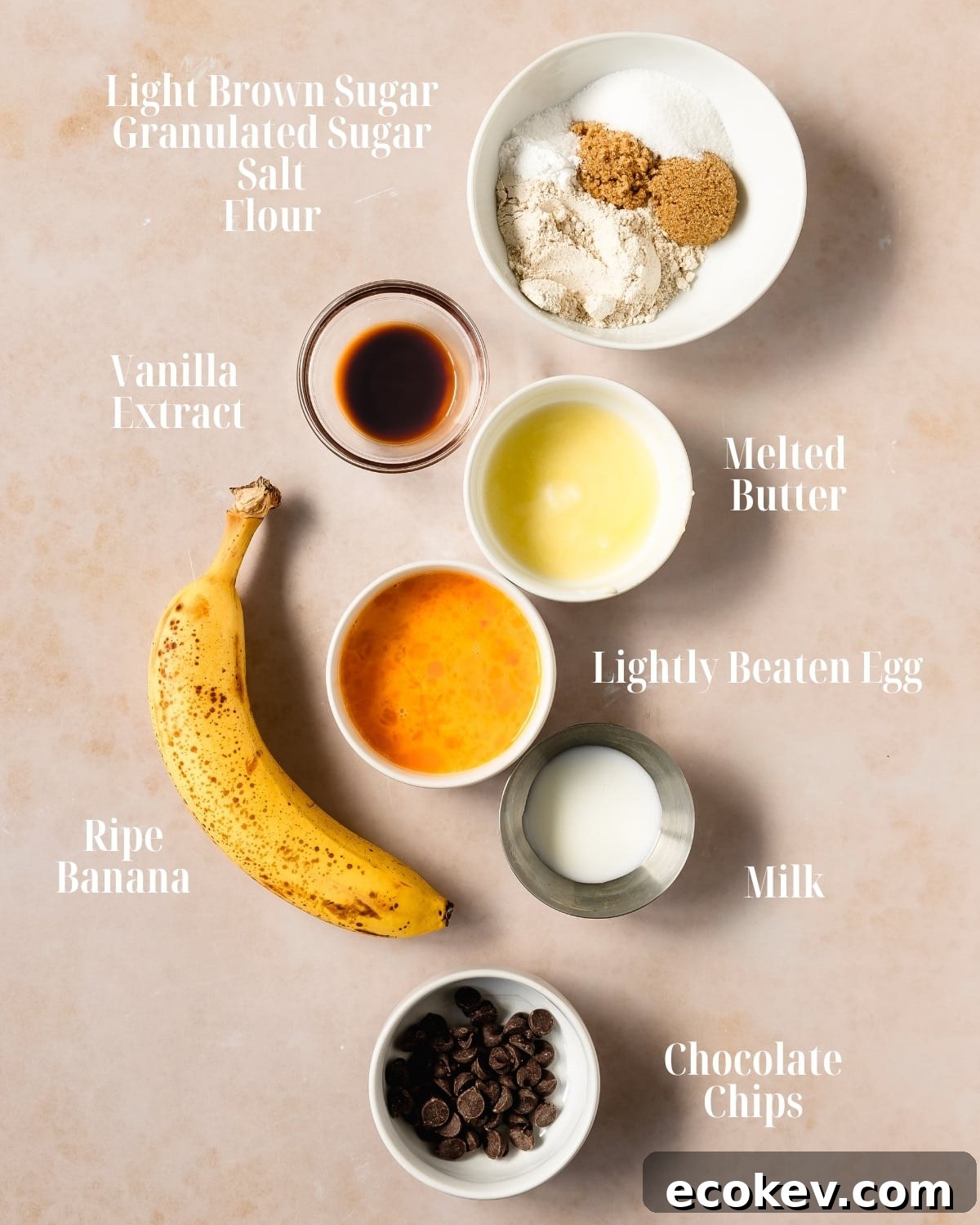 Gather crushed a very ripe banana, an egg, butter, milk, light brown or granulated sugar, salt, vanilla extract and flour. If you’d like, throw in a handful of chocolate chips.