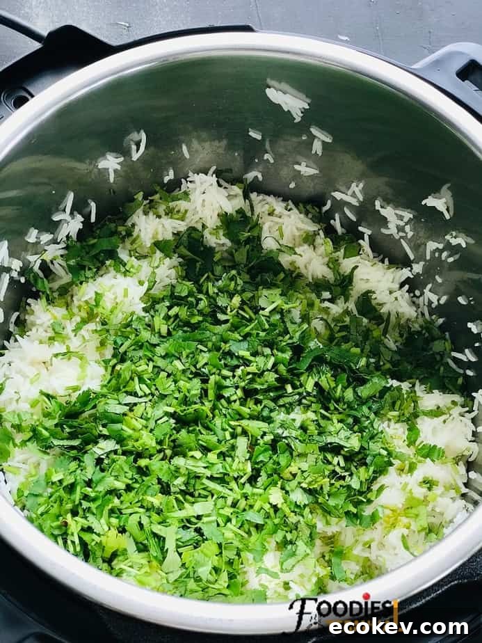 chopped cilantro on top of white rice in instant pot