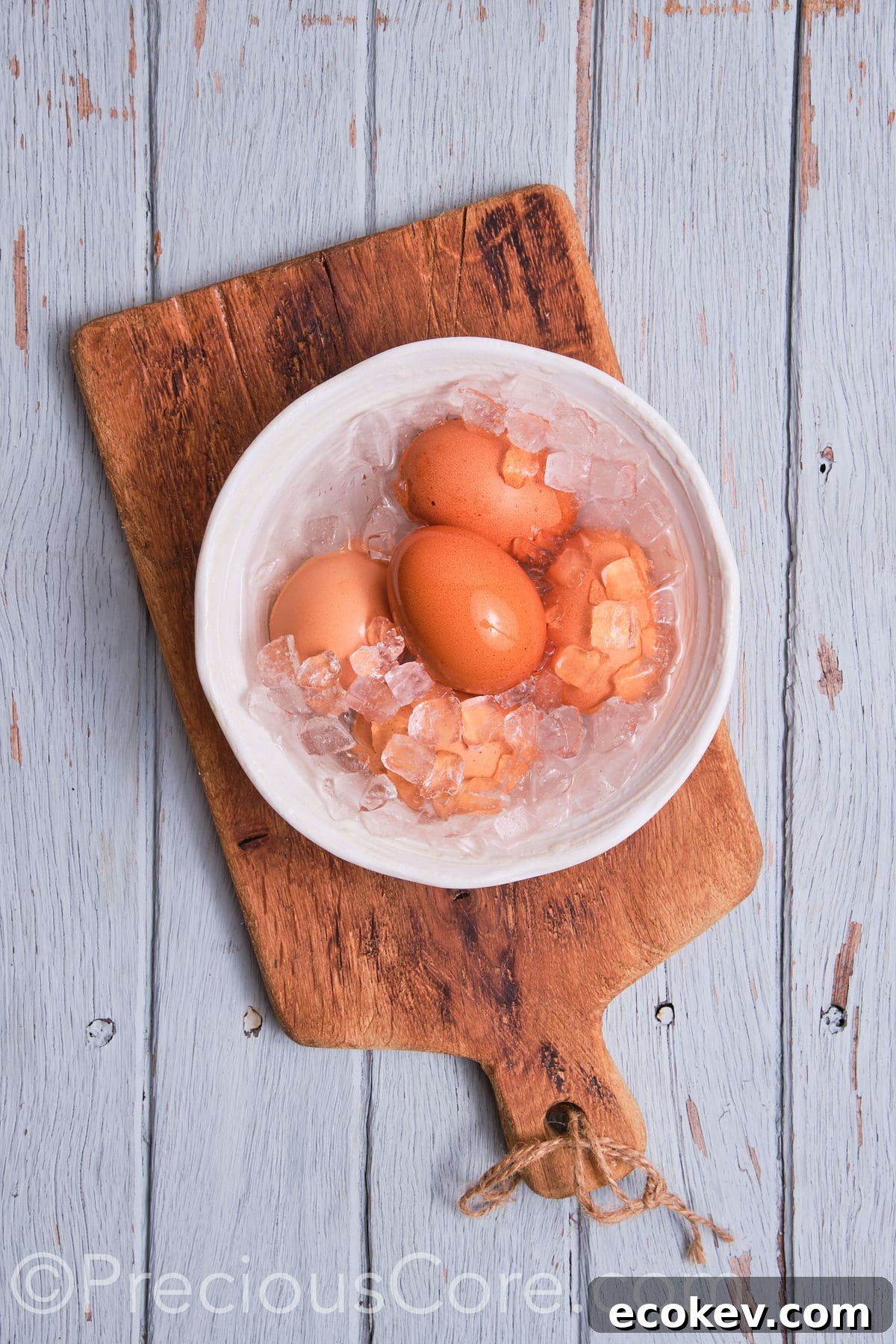 Boiled eggs in a bow filled with ice. 