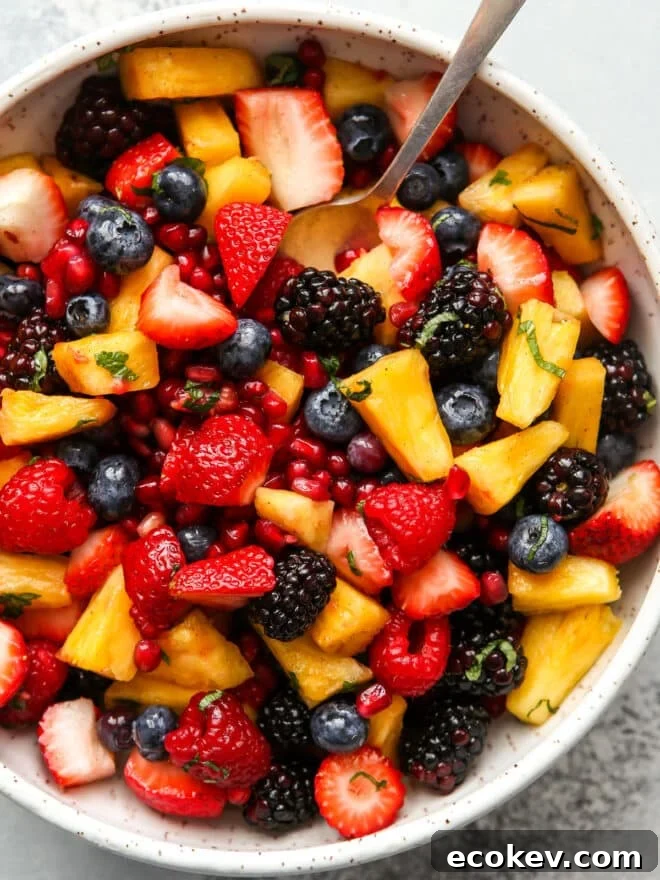 view of fruit salad with mint and vanilla