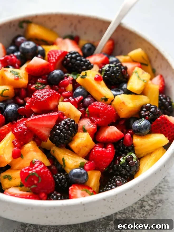 closeup of fruit salad with spoon