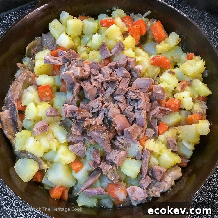 Chopped duck meat added to the hash; Duck Confit Potato Hash (Gluten Free) © 2017 Jane Bonacci, The Heritage Cook
