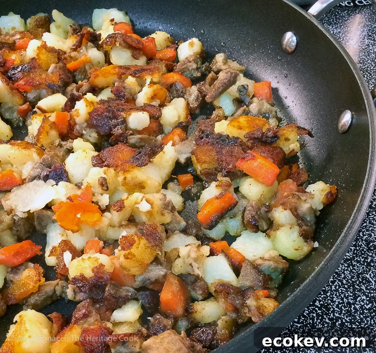 Hot in the skillet & ready to serve; Duck Confit Potato Hash (Gluten Free) © 2017 Jane Bonacci, The Heritage Cook