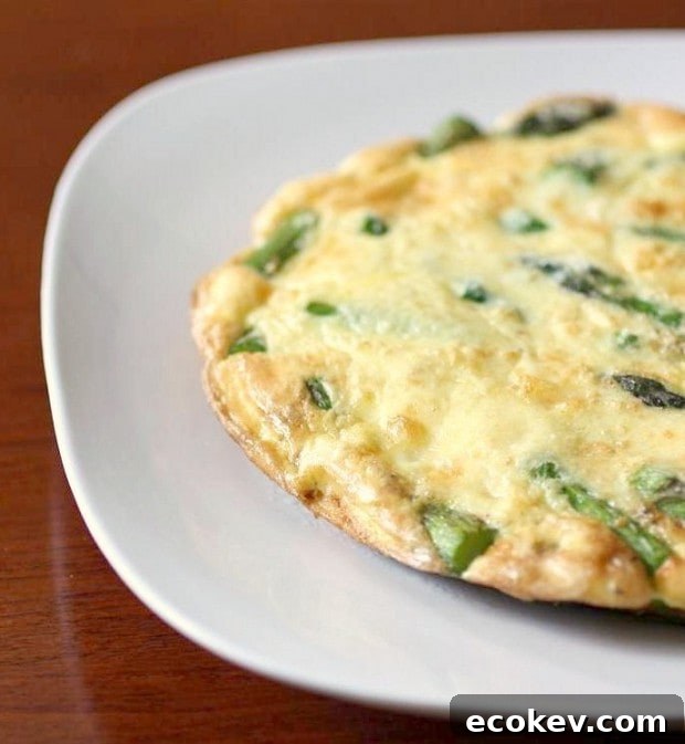 Asparagus Frittata on a white plate. 