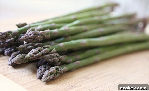 Fresh asparagus on a cutting board. 