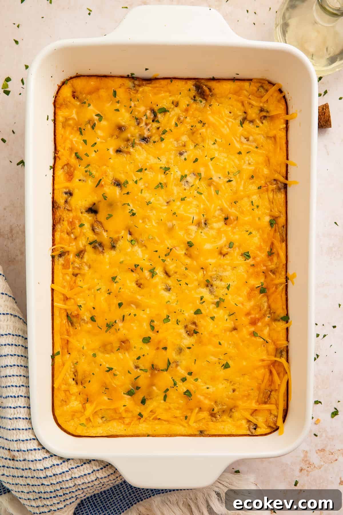 Top down view showing the melted cheese on top of a high protein egg bake.