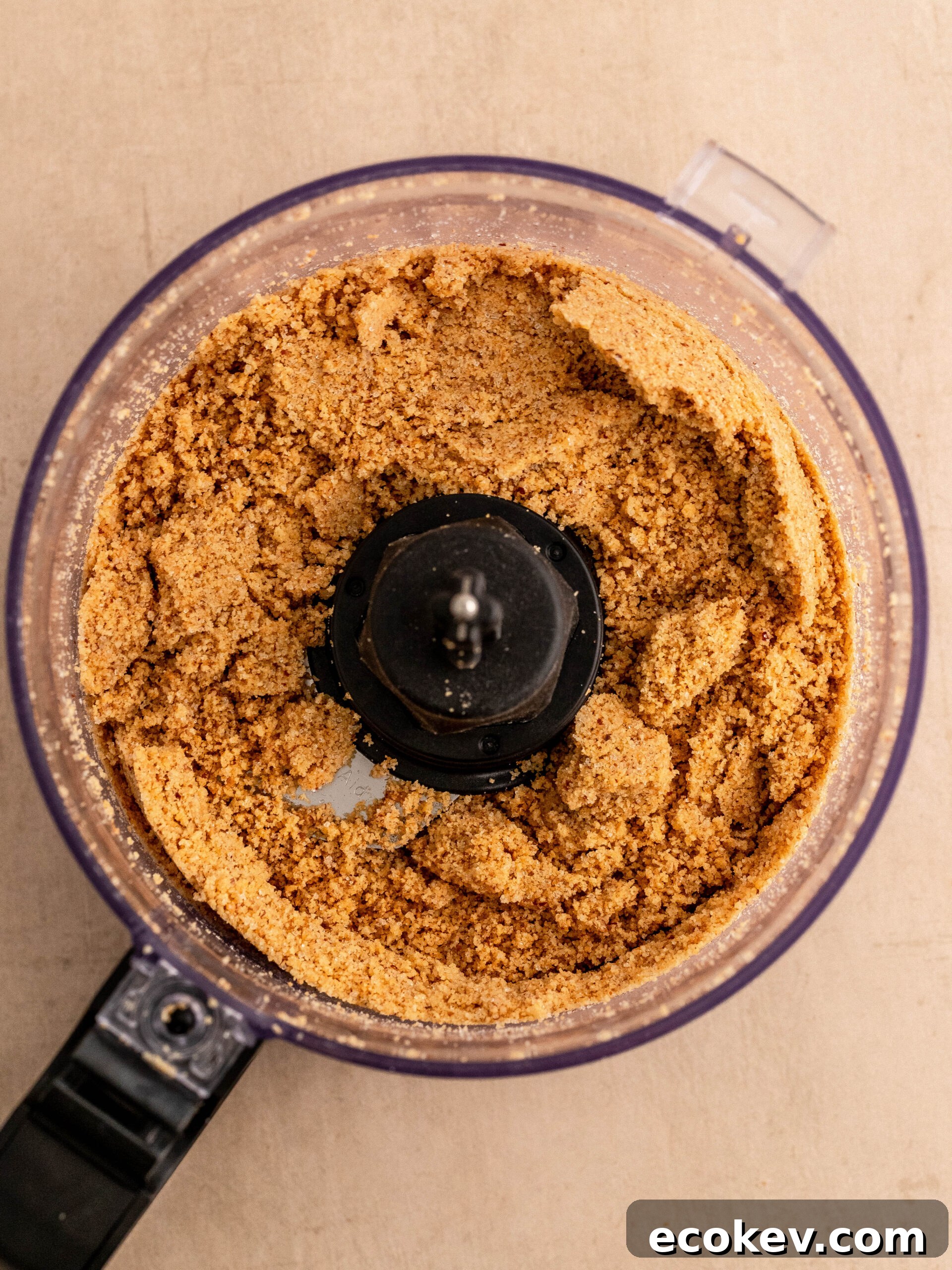 Step 2. Blend the digestive cookies with the pecan nuts.