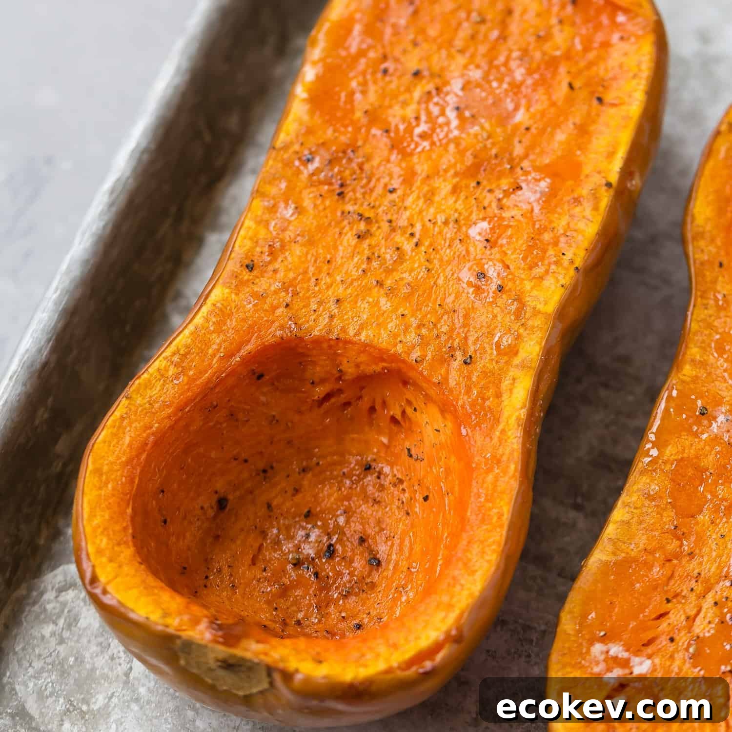 Roasted butternut squash half.