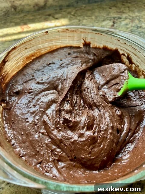 Dollops of peanut butter on batter.