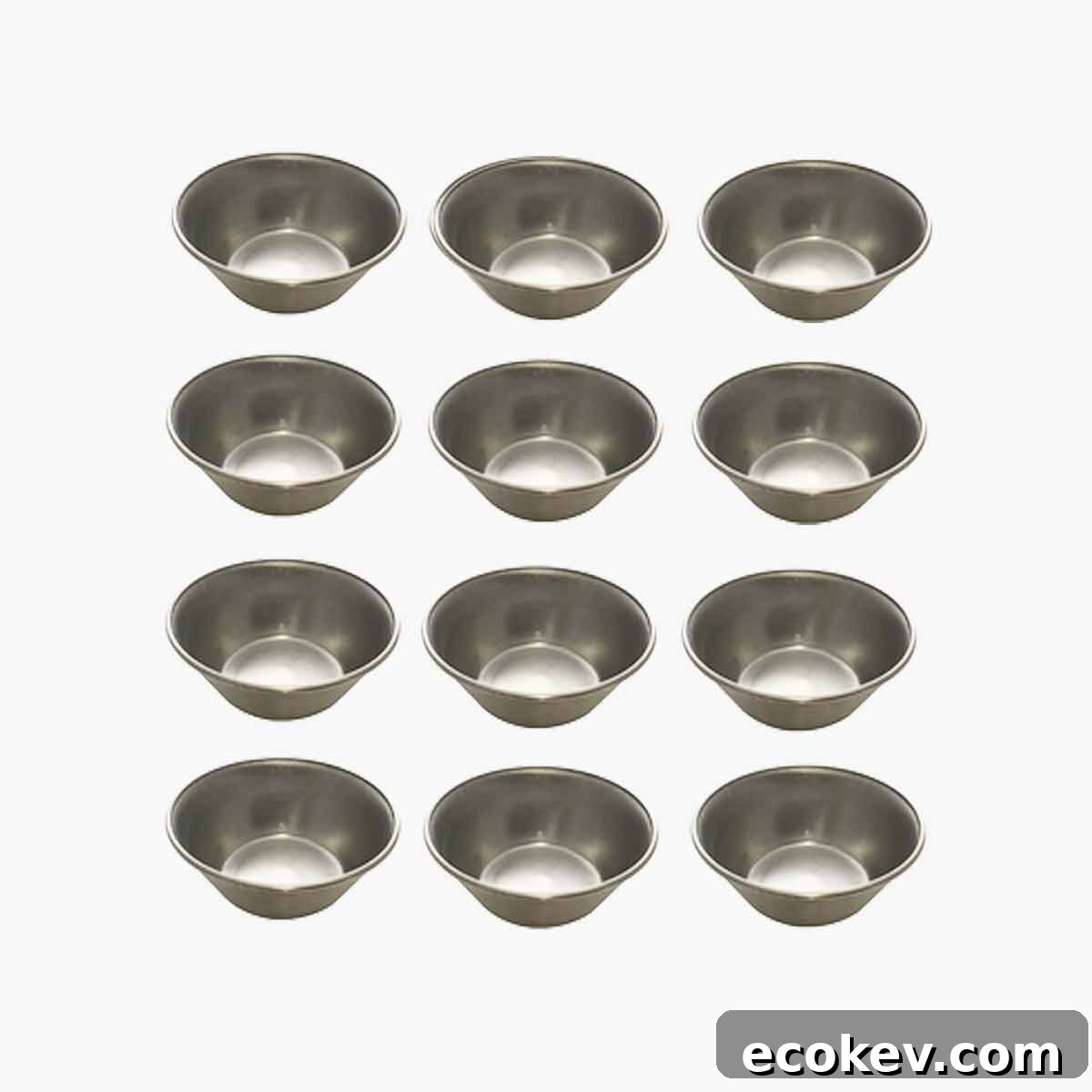 12 stainless pasteis de nata tins.