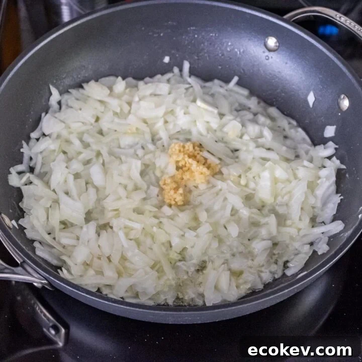 Butter, onions and garlic in a fry pan.